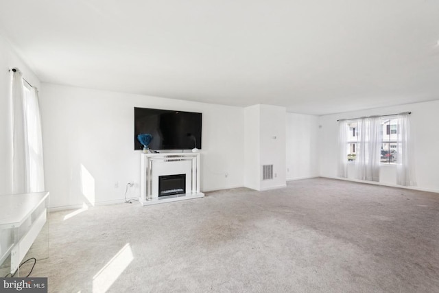 161 Ciseley Dr, Sicklerville, NJ 08081 - unfurnished living room with carpet and a glass covered fireplace