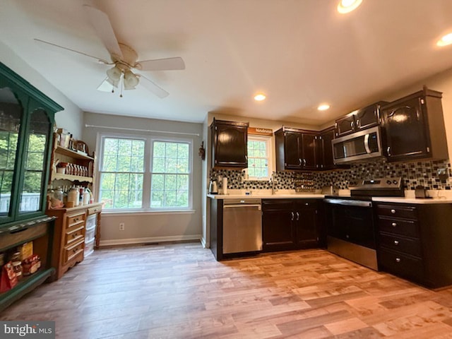 39410 Thomas Dr, Mechanicsville, MD 20659 - kitchen with appliances with stainless steel finishes, light countertops, plenty of natural light, and recessed lighting