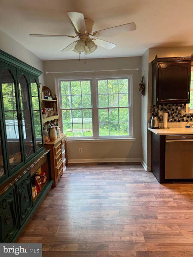 39410 Thomas Dr, Mechanicsville, MD 20659 - unfurnished dining area featuring ceiling fan, light wood finished floors, and baseboards