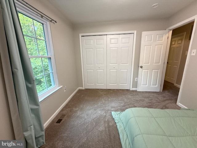39410 Thomas Dr, Mechanicsville, MD 20659 - unfurnished bedroom with carpet, baseboards, and a closet