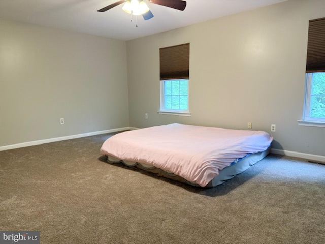 39410 Thomas Dr, Mechanicsville, MD 20659 - carpeted bedroom featuring baseboards and ceiling fan