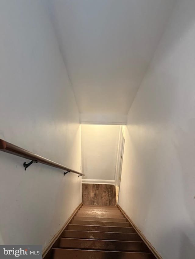 39410 Thomas Dr, Mechanicsville, MD 20659 - stairs with hardwood / wood-style flooring and vaulted ceiling