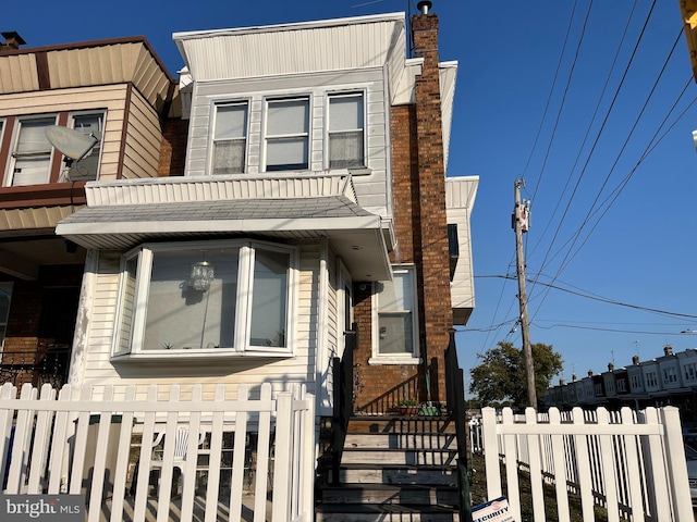 6001 N Mascher St, Philadelphia, PA 19120 - townhome / multi-family property with a chimney