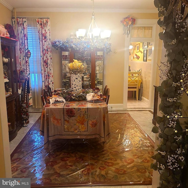 1115 Bentalou St, Baltimore, MD 21216 - tiled dining room featuring a chandelier and ornamental molding