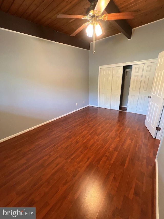 4379 Americana Dr Unit 201, Annandale, VA 22003 - unfurnished bedroom featuring wood ceiling with exposed beams, dark wood-style flooring, a closet, ceiling fan, and baseboards