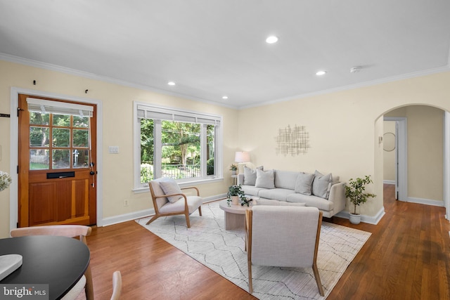 416 Penwood Rd, Silver Spring, MD 20901 - living area featuring arched walkways, ornamental molding, wood finished floors, and recessed lighting