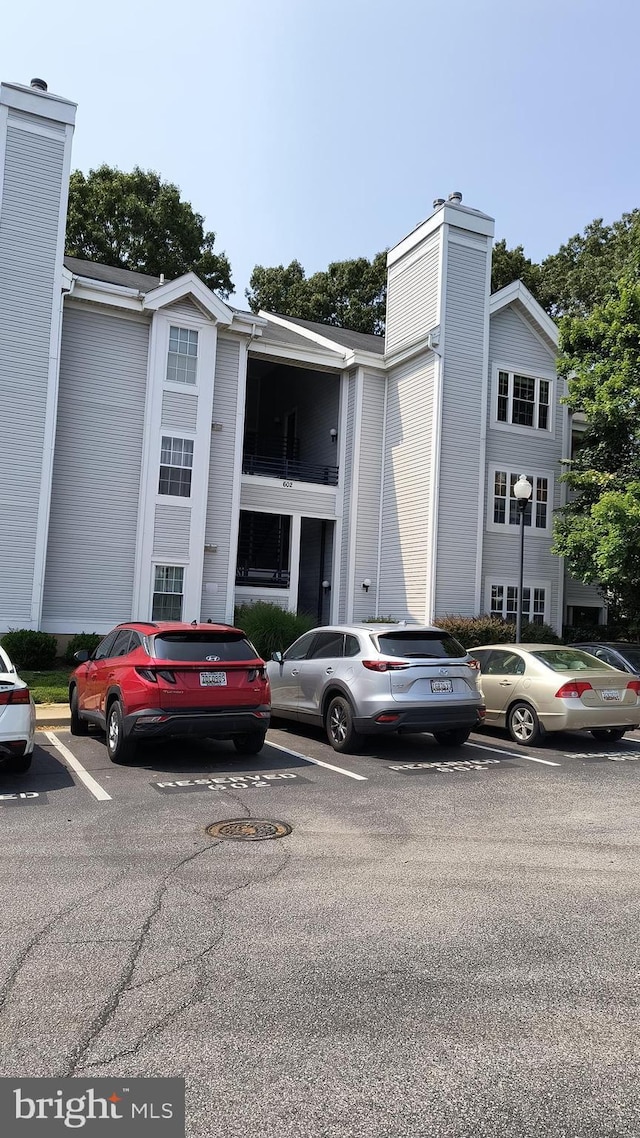 602 Moonglow Rd Unit 202, Odenton, MD 21113 - view of building exterior with uncovered parking
