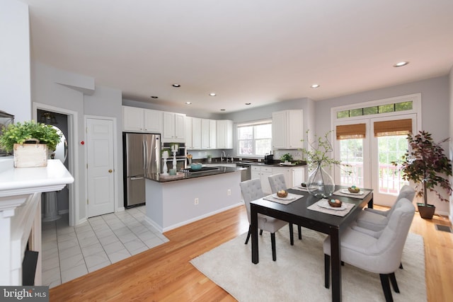 20976 Kittanning Ln, Ashburn, VA 20147 - dining area featuring recessed lighting, light wood-style floors, and baseboards