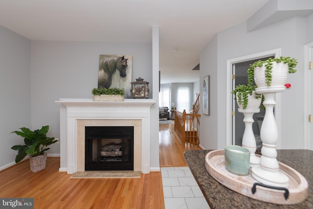 20976 Kittanning Ln, Ashburn, VA 20147 - living area with a fireplace and light wood-type flooring