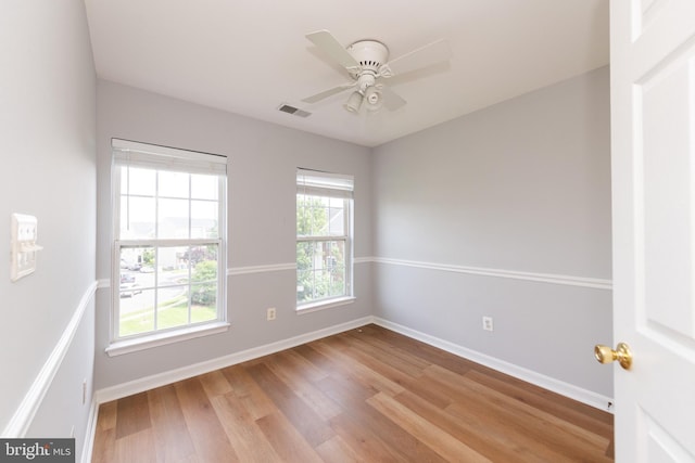 20976 Kittanning Ln, Ashburn, VA 20147 - spare room with baseboards, wood finished floors, and a ceiling fan