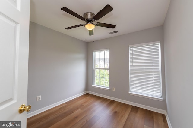 20976 Kittanning Ln, Ashburn, VA 20147 - spare room featuring wood finished floors, baseboards, and a ceiling fan