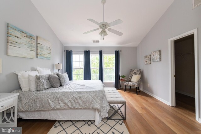 20976 Kittanning Ln, Ashburn, VA 20147 - bedroom with lofted ceiling, light wood-style flooring, baseboards, and a ceiling fan