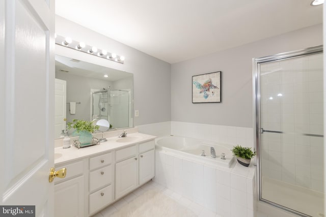20976 Kittanning Ln, Ashburn, VA 20147 - bathroom with double vanity, a shower stall, a bath, and tile patterned flooring
