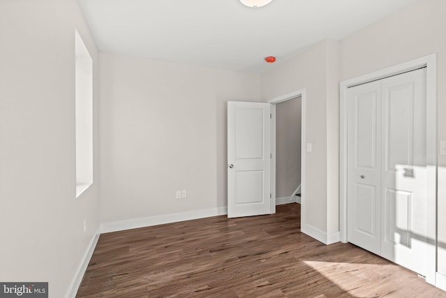 2453 Turner St, Philadelphia, PA 19121 - unfurnished bedroom with wood finished floors, a closet, and baseboards