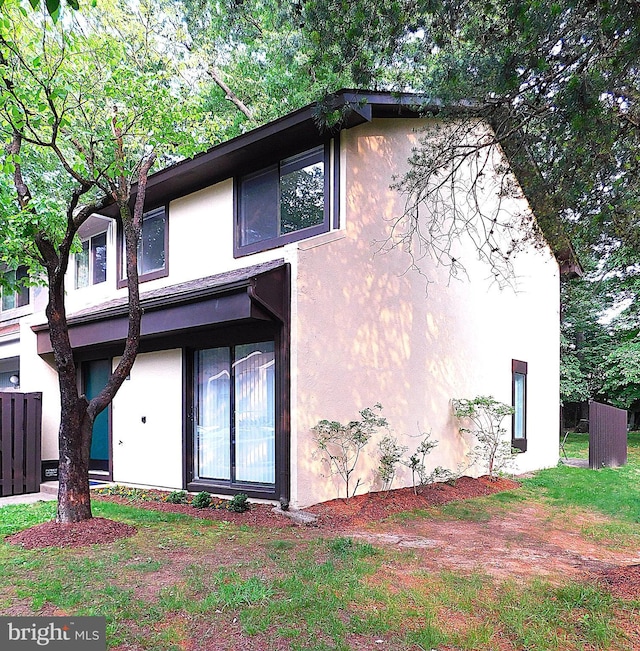 2241 Cartwright Pl, Reston, VA 20191 - rear view of house with stucco siding