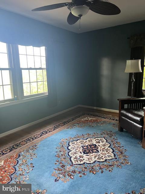 232 N Shore Ct, Seaford, DE 19973 - spare room featuring a ceiling fan and baseboards