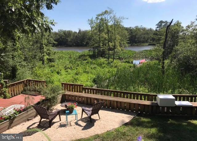 232 N Shore Ct, Seaford, DE 19973 - view of community with a water view and a view of trees