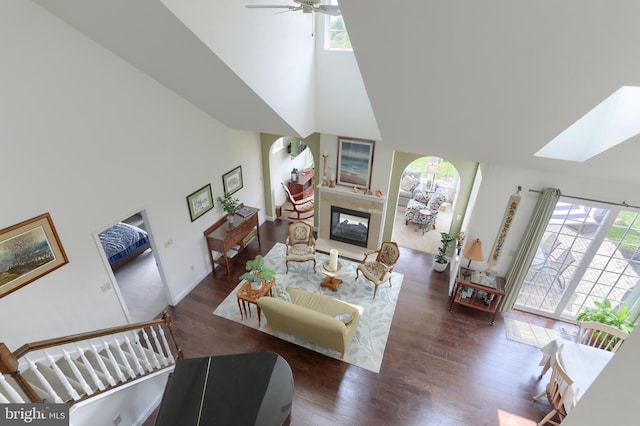 126 Windermere Dr, Palmyra, PA 17078 - living room featuring a towering ceiling, plenty of natural light, a ceiling fan, and wood finished floors