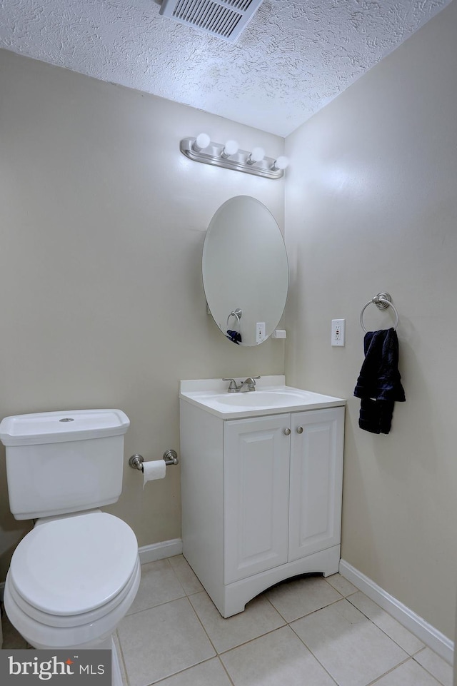 3574 Brickwall Ln, Pasadena, MD 21122 - half bathroom with vanity, tile patterned floors, a textured ceiling, baseboards, and toilet