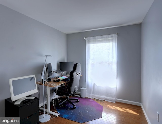 3574 Brickwall Ln, Pasadena, MD 21122 - home office with hardwood / wood-style floors and baseboards