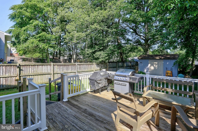 3574 Brickwall Ln, Pasadena, MD 21122 - wooden terrace with area for grilling and a fenced backyard