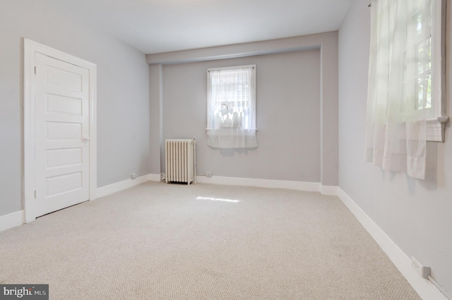 3024 Tilden St NW # 6, Washington, DC 20008 - unfurnished room with radiator, carpet, and baseboards