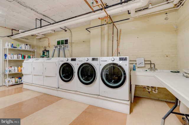 3024 Tilden St NW # 6, Washington, DC 20008 - community laundry with washing machine and dryer and light floors