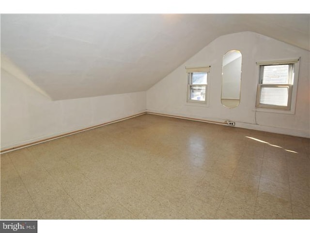 7728 Union Ave, Elkins Park, PA 19027 - bonus room with vaulted ceiling, tile patterned floors, and baseboards