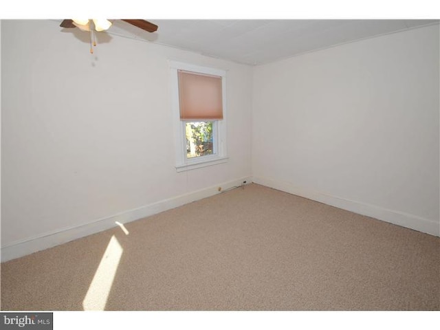 7728 Union Ave, Elkins Park, PA 19027 - empty room featuring light colored carpet, ceiling fan, and baseboards