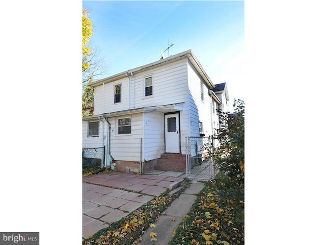 7728 Union Ave, Elkins Park, PA 19027 - rear view of house featuring entry steps, a gate, and a patio area