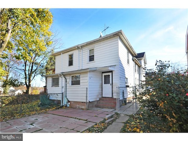 7728 Union Ave, Elkins Park, PA 19027 - rear view of property with a gate and entry steps