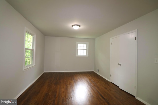 7009 Wood Thrush Dr, Lanham, MD 20706 - empty room with wood finished floors and baseboards