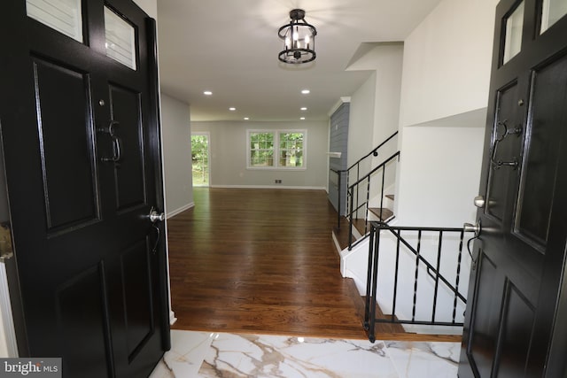 7009 Wood Thrush Dr, Lanham, MD 20706 - foyer with stairway, wood finished floors, baseboards, and recessed lighting
