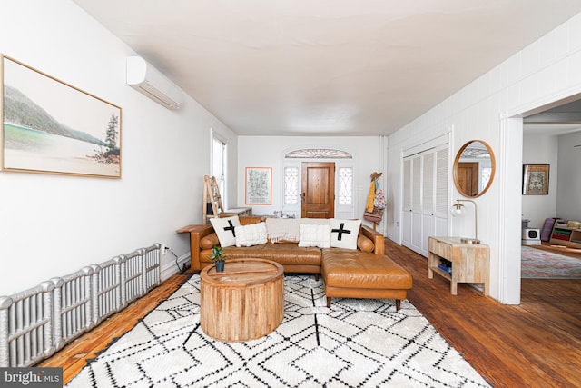 510 E Main St, Birdsboro, PA 19508 - living area featuring a wall mounted AC and wood finished floors