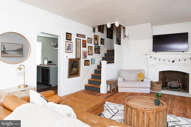 510 E Main St, Birdsboro, PA 19508 - living room with stairs, a fireplace, and wood finished floors