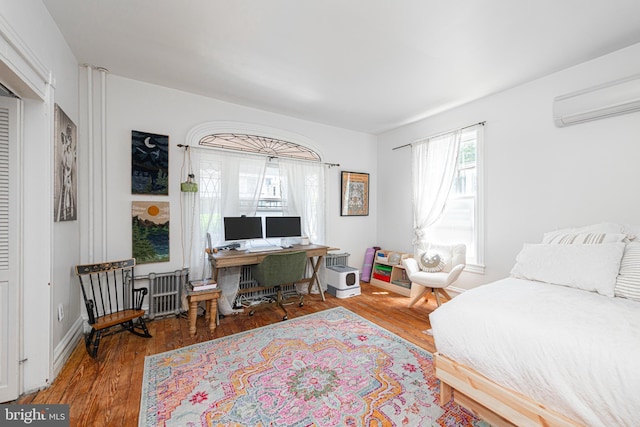 510 E Main St, Birdsboro, PA 19508 - bedroom featuring hardwood / wood-style floors and an AC wall unit