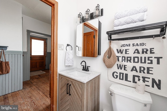 510 E Main St, Birdsboro, PA 19508 - bathroom featuring toilet, vanity, and wood finished floors
