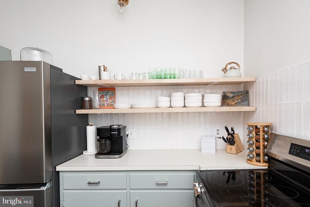 510 E Main St, Birdsboro, PA 19508 - kitchen featuring stainless steel appliances, backsplash, open shelves, and light countertops