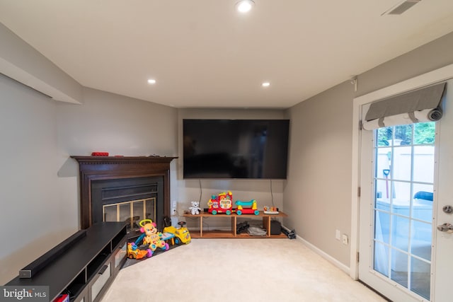 12306 Quail Woods Dr, Germantown, MD 20874 - playroom with carpet flooring, a glass covered fireplace, recessed lighting, and baseboards