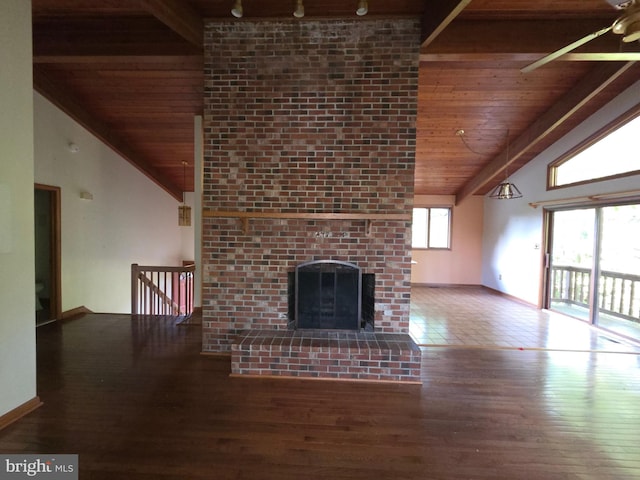 1780 Twirly Ct, Prince Frederick, MD 20678 - unfurnished living room with wooden ceiling, wood finished floors, rail lighting, a brick fireplace, and a ceiling fan