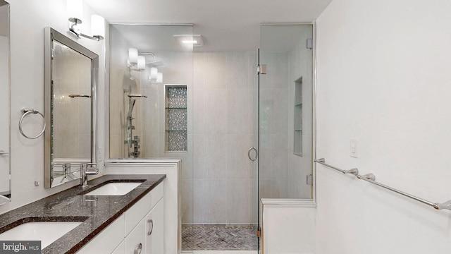 225 Dupont Cir, Wilmington, DE 19809 - bathroom with a stall shower and double vanity
