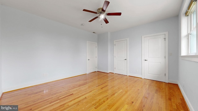 225 Dupont Cir, Wilmington, DE 19809 - unfurnished bedroom featuring light wood-style flooring and ceiling fan