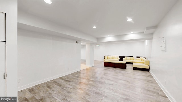 225 Dupont Cir, Wilmington, DE 19809 - unfurnished living room with wood finished floors and recessed lighting