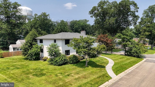 225 Dupont Cir, Wilmington, DE 19809 - view of home's exterior featuring a chimney