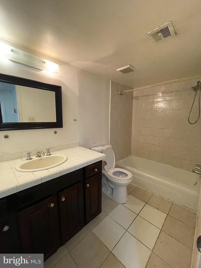 8477 Greenbelt Rd Unit 202, Greenbelt, MD 20770 - full bathroom featuring tile patterned floors, vanity, toilet, and bathtub / shower combination