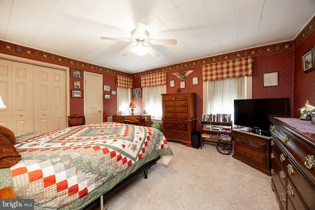 134 S 5th Ave, Royersford, PA 19468 - bedroom featuring light colored carpet, a closet, wallpapered walls, and ceiling fan