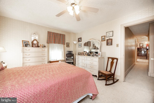134 S 5th Ave, Royersford, PA 19468 - bedroom with a textured ceiling, light carpet, ceiling fan, and wallpapered walls