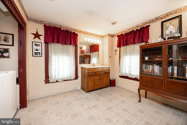 134 S 5th Ave, Royersford, PA 19468 - interior space featuring a textured ceiling, light carpet, wallpapered walls, and baseboards