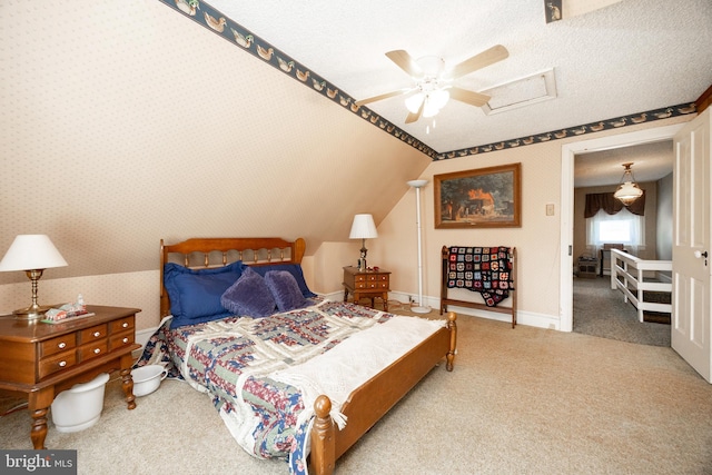 134 S 5th Ave, Royersford, PA 19468 - bedroom with carpet flooring, vaulted ceiling, attic access, a textured ceiling, and ceiling fan