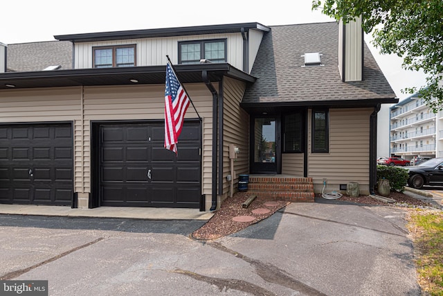 104 120th St Unit D82, Ocean City, MD 21842 - view of front facade featuring a shingled roof and asphalt driveway